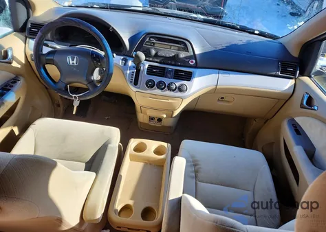 2010 Honda Odyssey Lx z USA, uszkodzony, nr VIN 5FNRL3H23AB056572